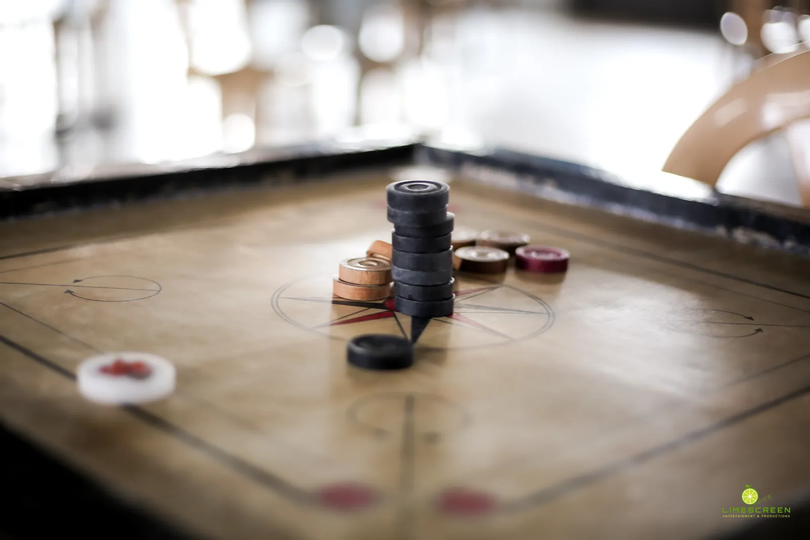 Carrom board set up for a game
