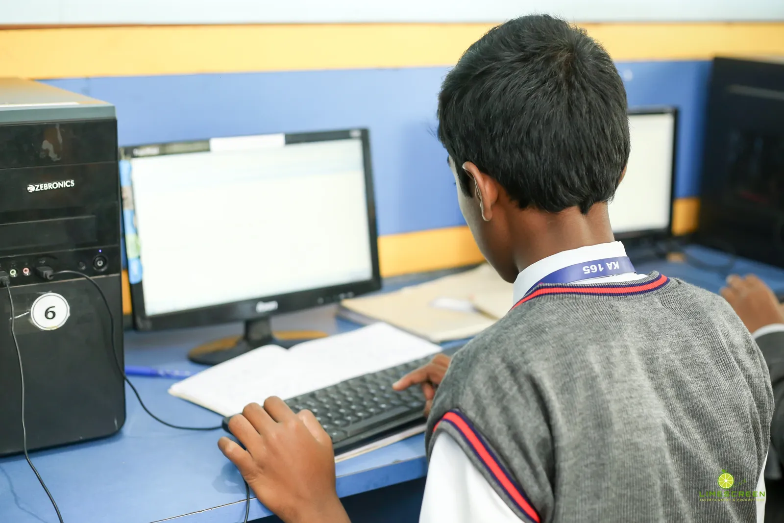 Student working on a computer in the computer lab