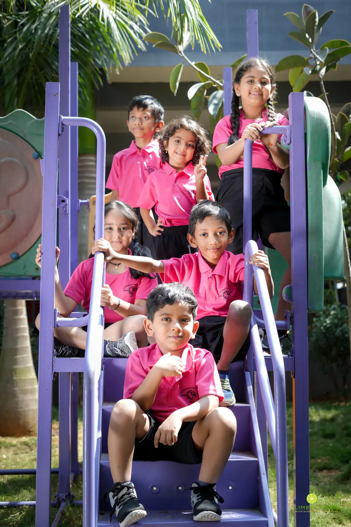 Young SPPS students playing together on the play structure
