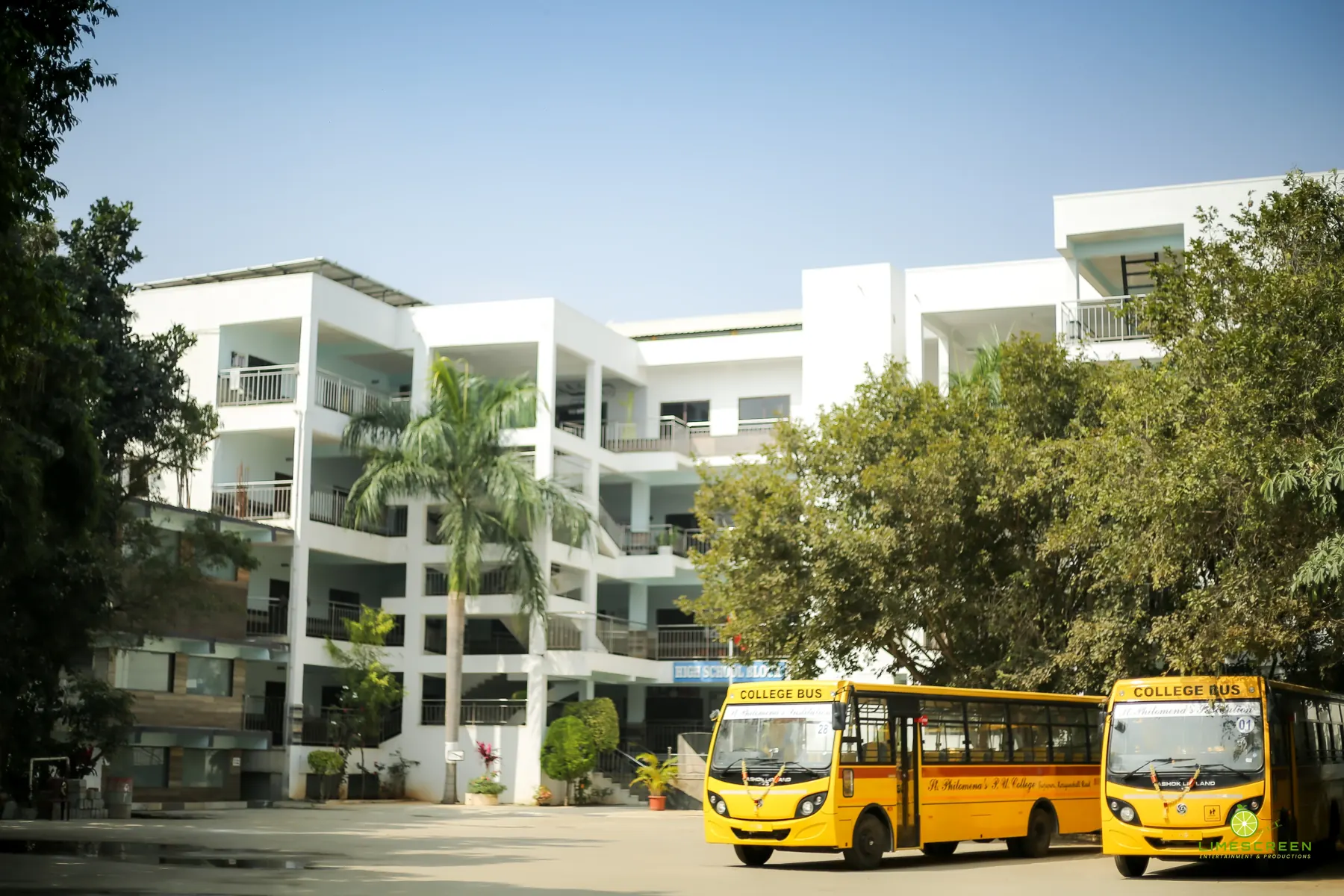 St. Philomena's Public School block with the school bus fleet