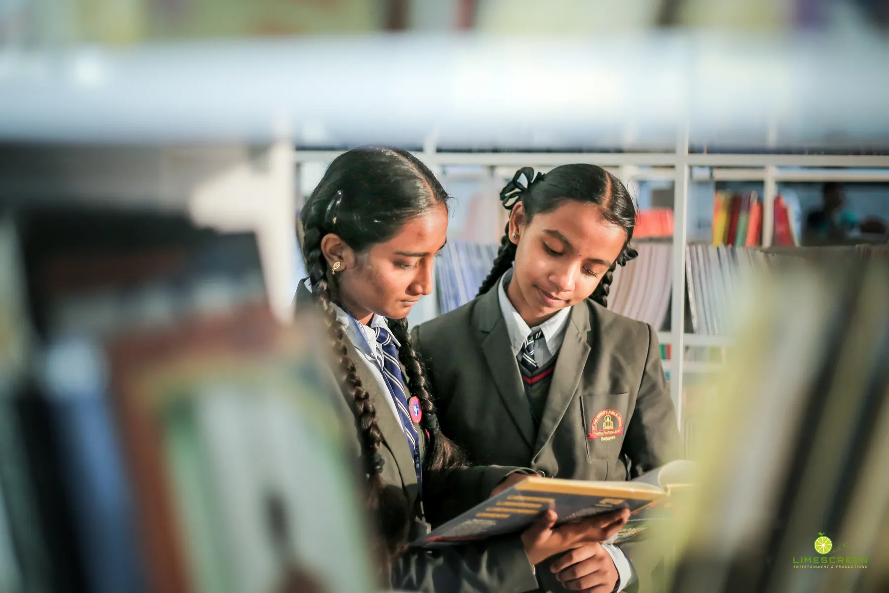 Students reading together in the SPPS library